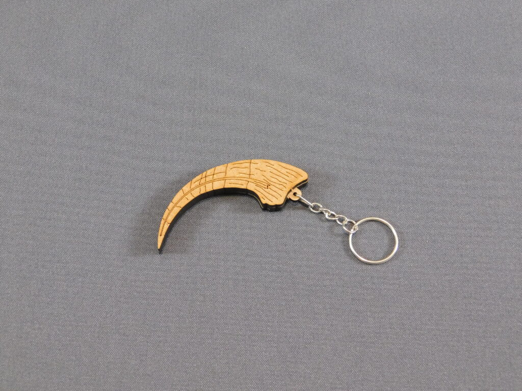 Paleo llaveros Garra Megaraptor namunhuaiquii